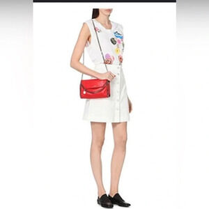 ! stella mccartney EMBELLISHED BUTTON-FRONT A-LINE SKIRT IN SNOW